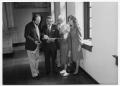 Thumbnail image of item number 1 in: '[Tom Kreneck and group looking at a document]'.