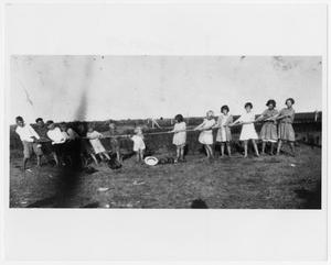 Primary view of object titled '[Children in Rope Pulling Contest]'.