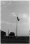 Photograph: Brodsgaard raising flag