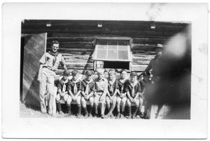 [Boy Scouts in Front of Log Cabin]