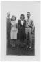 Photograph: [Two Couples of the Hansen Family Posed Outdoors]