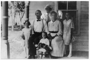 Primary view of object titled '[Berndt Family Sitting on a Porch]'.