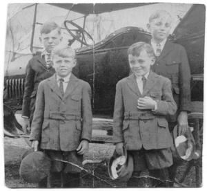 Young Boys in Front of Car