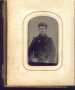 Thumbnail image of item number 1 in: '[Unidentified young man wearing dark clothing and a hat]'.
