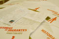 Photograph: [Close-up of letters and brochures on desk of Oscar Solis Flores]