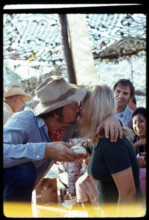 [Cowboy Kissing a Woman]