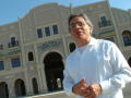 Thumbnail image of item number 1 in: '[Jose Legaspi in front of Fort Worth Mercado]'.