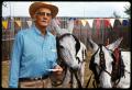 Photograph: [Jerry Young with Two Mules]
