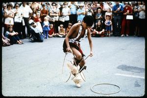[Young Alabama-Coushatta Indian Dancer Performing with Rings]