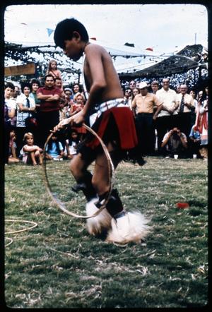 [Young Alabama-Coushatta Indian Dancer Performs for Crowd]
