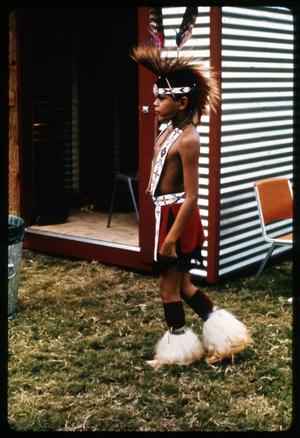 [Young Alabama-Coushatta Indian Dancer with Headdress]