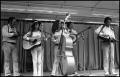 Thumbnail image of item number 1 in: '[Bluegrass Band Performing on a Stage]'.
