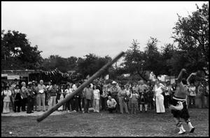 [Man Participating in the Scottish Sport of Caber Throwing]