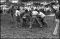 Photograph: [Tigua and Alabama Coushatta Tribes Playing Stickball]