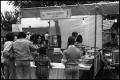 Primary view of [Tacos De Barbacoa Booth Serving Food]