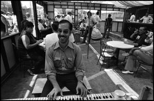 [Piano Player at the Texas Folklife Festival]