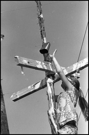 [Girl Climbing Mast at the Texas Folklife Festival]