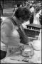 Photograph: [Betty Lange Preparing Food at the Texas Folklife Festival]