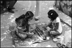 [Girls Playing Chunca at the Texas Folklife Festival]