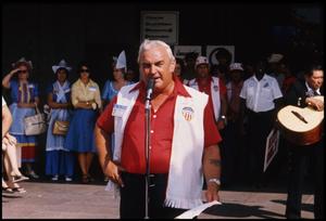 Primary view of object titled '[Master of Ceremonies at the 1975 Texas Folklife Festival]'.