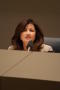 Photograph: [Elba Garcia sitting and listening during meeting]