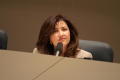 Primary view of [Elba Garcia sitting during meeting]