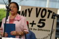 Primary view of [Adelfa Callejo speaking at a voting promotion event]