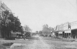 [Main Street in Rosenberg, water tower at the end of the street]