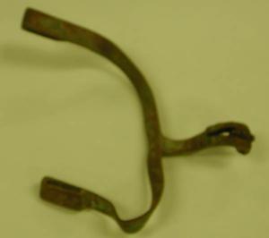 spur, worn finish, has been bent and flattened.