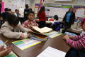 Primary view of [Nancy Jimenez directs the activities of her class at Crockett Elementary]