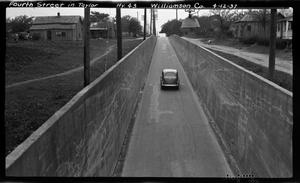 [Photograph of Fourth Street in Taylor, Texas]