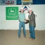 Photograph: [Two men in an award presentation at Will Rogers Coliseum]