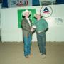 Photograph: [Two men in an award presentation at Will Rogers Coliseum]