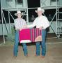 Photograph: [Two men in Youth division award presentation at Will Rogers Coliseum]