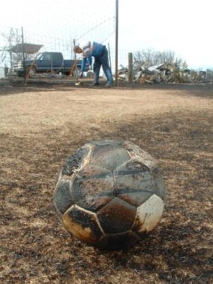 Primary view of object titled '[Scorched soccer ball]'.