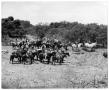 Primary view of [Photograph of a Group on Horseback]