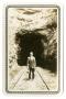 Photograph: [Photograph of a Man Outside a Railroad Tunnel]