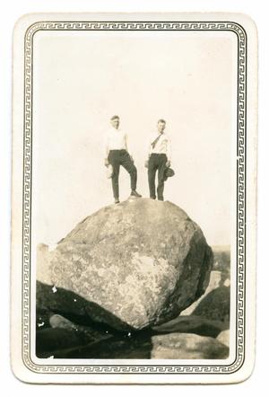 Primary view of object titled '[Photograph of Two Men Standing on Balanced Rock]'.