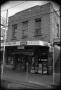 Thumbnail image of item number 1 in: '[Photograph of a Drug Store in Fredericksburg]'.