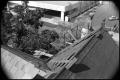Photograph: [Photograph of a Worker on a Roof]