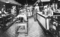 Primary view of [Unidentified clerks in general store]
