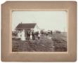 Thumbnail image of item number 1 in: '[Unidentified family in front of home]'.