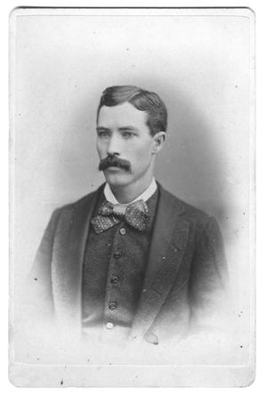 [Portrait of a man with a mustache and bow tie]