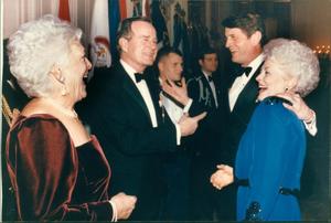 [Barbara and George H.W. Bush speak with Charlie Wilson and Ann Richards]