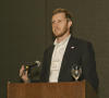 Photograph: [Josh Perkin Speaking at TCAFS Annual Meeting]