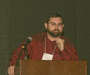Primary view of object titled '[Aaron Urbanczyk Speaking at TCAFS Annual Meeting]'.
