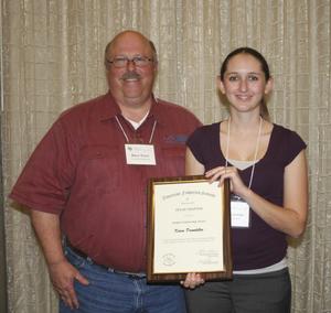 [Karen Drumhiller accepts award at the 2012 annual meeting banquet]