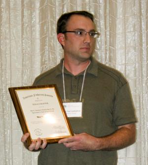 [Matt VanLandeghem with scholarship award at the 2012 annual meeting banquet]