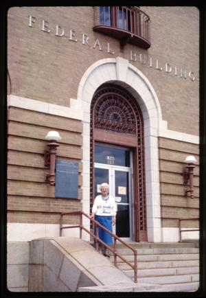 [Unidentified Woman on Steps of Federal Building]
