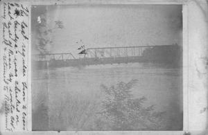 [Photograph of Train on Brazos River Bridge During Flood]
